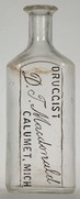 D. T. Macdonald bottle