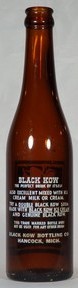 Black Kow bottle